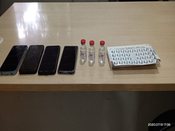 Seized COVID-19 antiviral drugs and mobiles. (Photo/ANI)