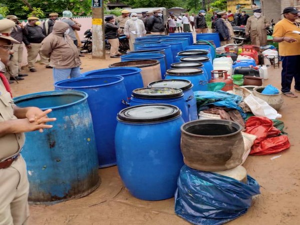 The seized containers of country liquor and jaggery wash (Photo/ANI)