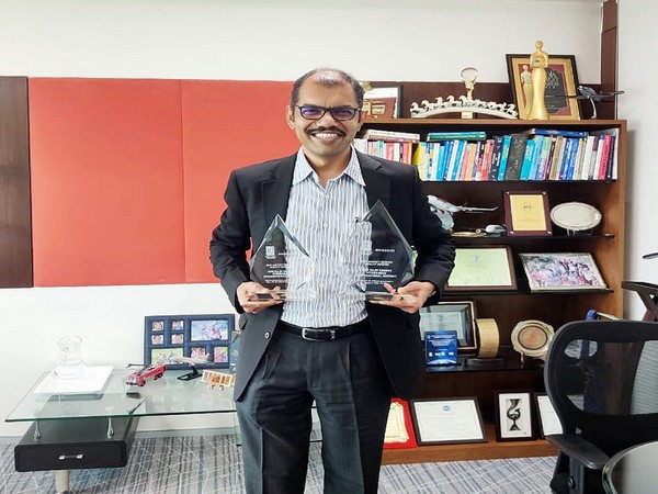 Pradeep Panicker, CEO- GHIAL posing with trophies (Photo/GHIAL)