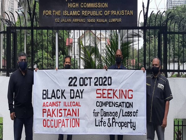 People protesting against Pakistan's invasion of Jammu and Kashmir on October 22, 1947, in front of the Pakistan Embassy in Malaysia on Thursday.