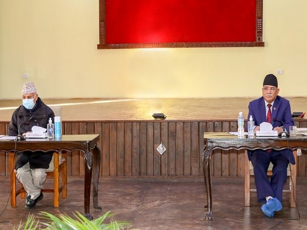 Nepal PM KP Sharma Oli and Nepal Communist Party Chairman Pushpa Kamal Dahal.
