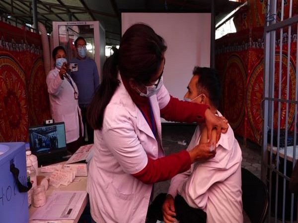 Frontline workers reciving a dose of the Covishield vaccine in Kathmandu (Photo/ANI) 