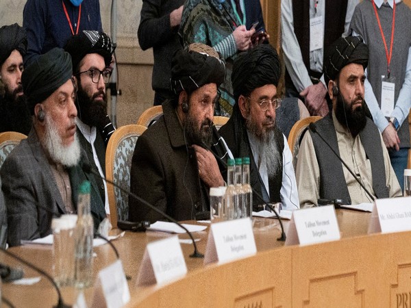 Mullah Abdul Ghani Baradar, the Taliban's deputy leader and negotiator, and other delegation members attend the Afghan peace conference in Moscow, Russia March 18, 2021.