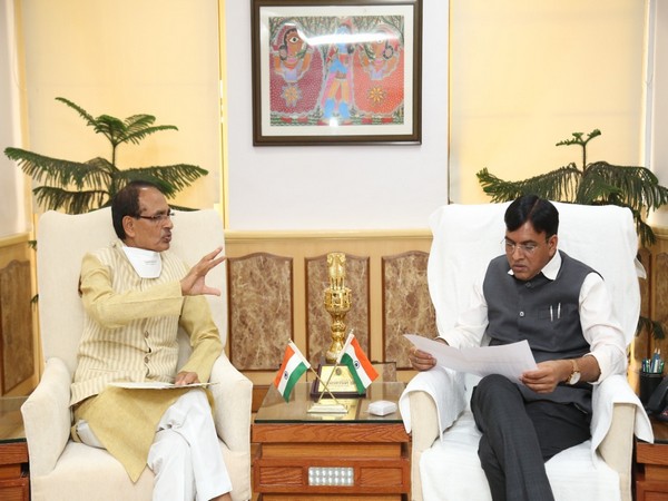 Chief Minister Shivraj Singh Chouhan with Union Minister Mansukh Mandaviya in New Delhi on Monday.
