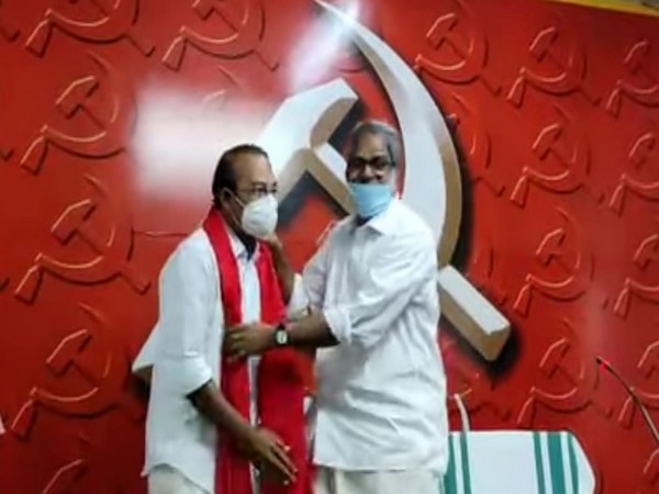 Former Congress leader PS Prasanth with CPI (M) State Secretary A. Vijayaraghavan at AKG centre (Photo/ANI)