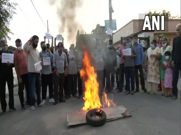 Kashmiri Pandits stage protest against the killing of civilians in Kashmir in Muthi area of Jammu (Photo:Twitter/ANI)
