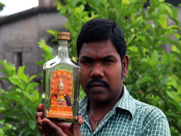 Miniature artist Rao crafts eco-friendly idol of Goddess Durga inside bottle. 
