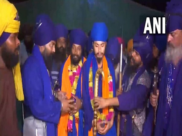 Deatined Nihangs with garlands around their neck (Photo:ANI)