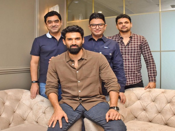 Aditya Roy Kapur with the makers of 'Thadam' remake