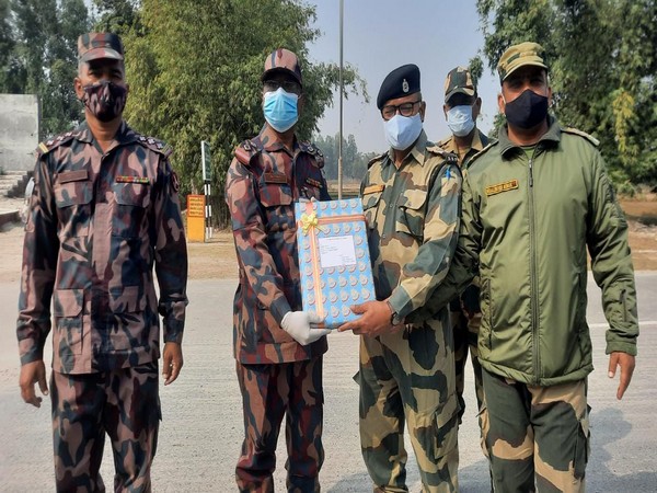 Border Security Force (BSF) and Border Guards Bangladesh (BGB) exchanged sweets at Fulbari Indo-Bangladesh border