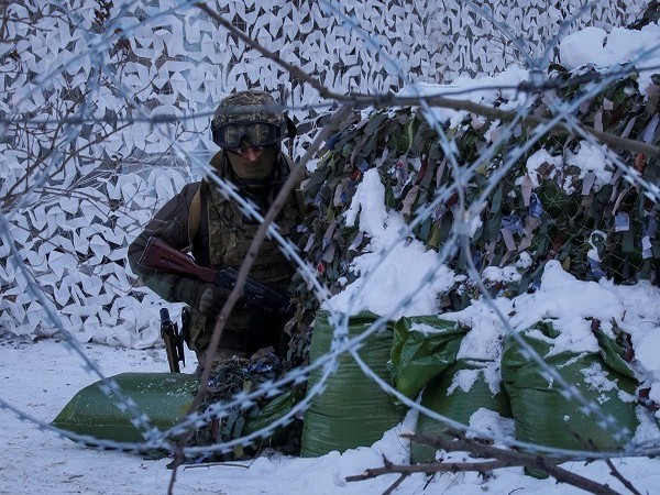 A Service member takes part in tactical exercises, which are conducted by Ukrainian National Guard, Armed Forces, in the city of Pripyat, Ukraine February 4. (Photo Credit: Reuters)