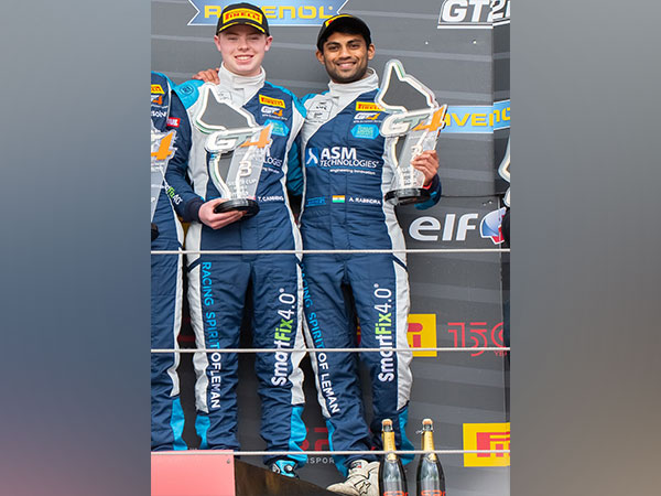 Drivers Tom Canning and Akhil Rabindra after podium finish at European GT4 Series