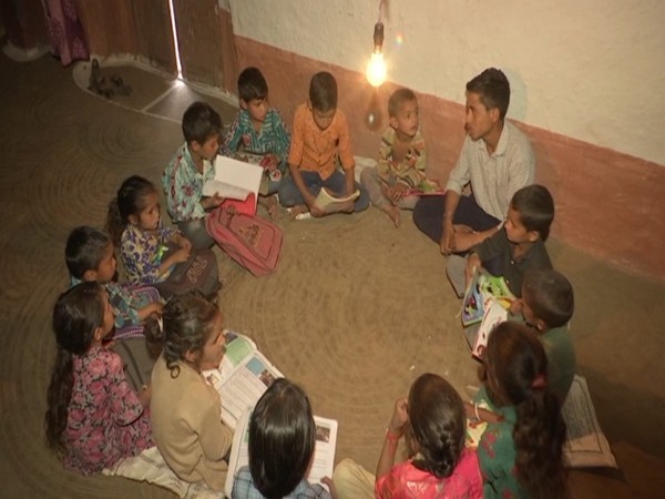 Children studying at a house in village Saddal (Photo/ANI)