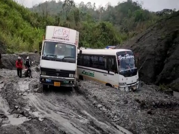 Vehicles stuck on national highway in Assam after landslide (Photo/ANI)
