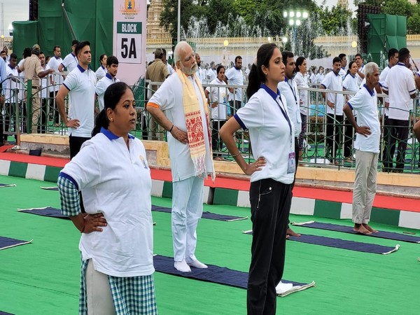 PM Modi performs Yoga during International Yoga Day event at Mysuru Palace grounds on Tuesday.