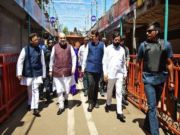 Union Home Minister Amit Shah with Maharashtra CM Eknath Shinde, State Deputy CM Devendra Fadnavis  visits Lalbaugcha Raja Pandal in Mumbai (Photo/ANI)