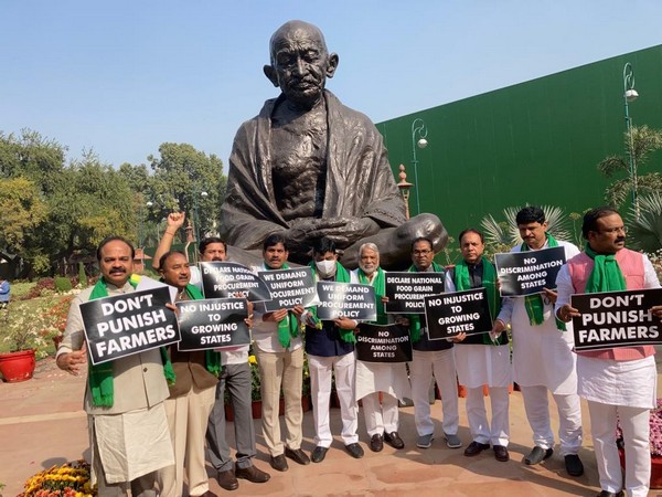 TRS MPs protesting at Gandhi statue in Parliament premises. (Photo/ANI)
