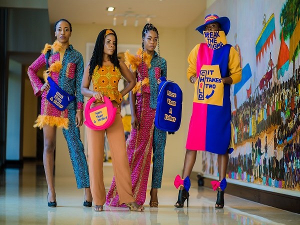 Winner of 'Merck More Than a Mother' Fashion Awards from Ghana - Augustina Annan, with models exhibiting her winning designs.