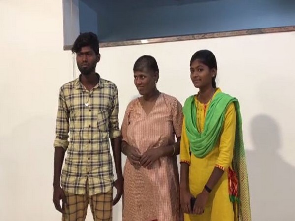    Mary's (in the middle) daughter and son who came to the White Doves destitute home to take her back home to Coimbatore.