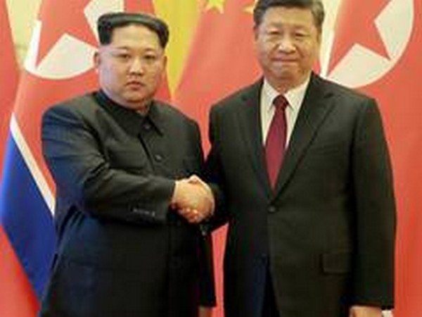 North Korean leader Kim Jong-un with Chinese President Xi Jinping (file photo)