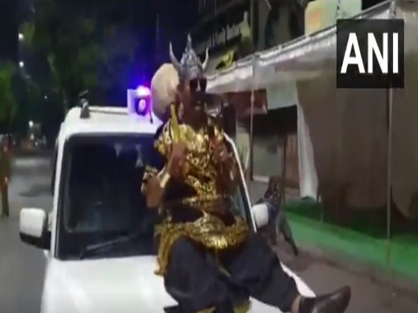 Police Constable Jawahar Singh dressed in black with a golden headgear shouted slogans on the streets of Indore about the dangers of stepping out of homes during the lockdown.