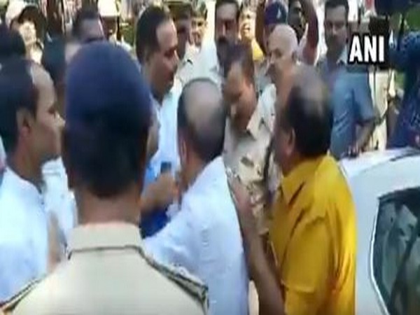 A still from the viral video showing scuffle between police and CM B S Yediyurappa's son-in-law Virupaksha Yamakanamaradi. Photo/ANI