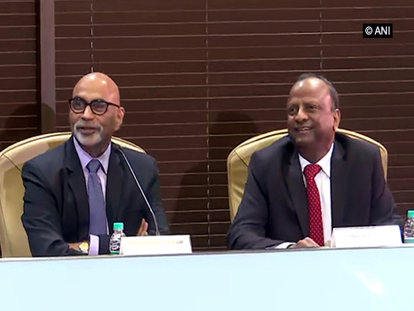 Yes Bank Administrator Prashant Kumar (left) with SBI Chairman Rajnish Kumar in Mumbai on Tuesday.