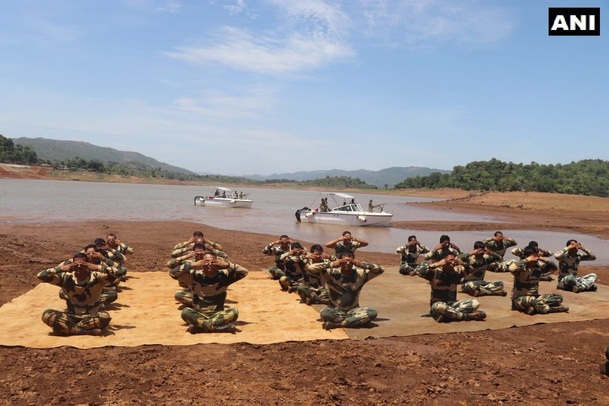 BSF troopers performed yoga in south Odisha's Naxal-affected Malkangiri district on Sunday.
