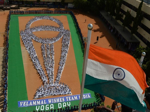 Children performing 'Yoga' in World Cup trophy formation in Chennai