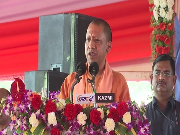 Uttar Pradesh Chief Minister Yogi Adityanath speaking to the public in Gorakhpur on Sunday.