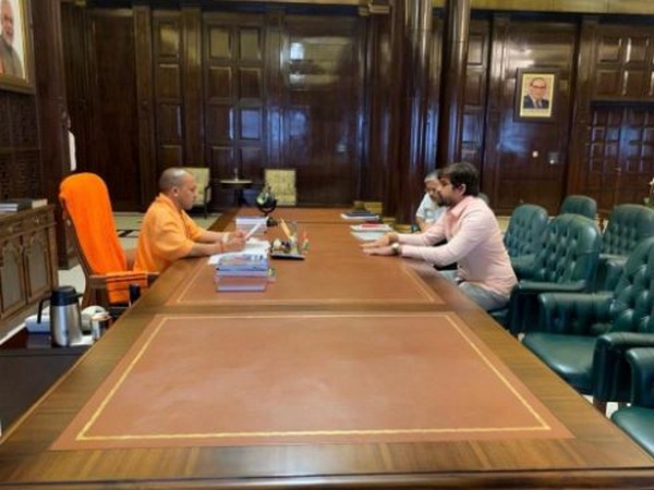 UP Chief Minister Yogi Adityanath meeting DUSU president Shakti Singh in Lucknow on Monday.   