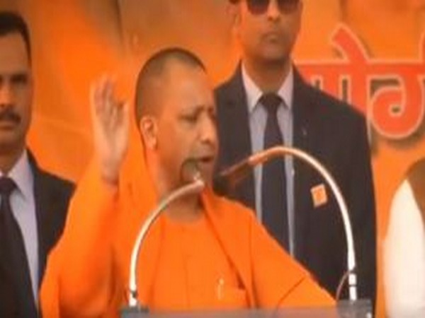 Uttar Pradesh Chief Minister Yogi Adityanath addressing a rally in Patparganj on Tuesday. Photo/ANI