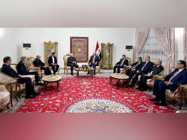 Iraq's President Barham Salih meets with Iranian Foreign Minsiter, Mohammad Javad Zarif, in Baghdad on Saturday