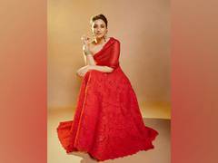 
      
      Parineeti Chopra channels old world romance in red ensemble
      
      
