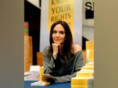 
      
      Angelina Jolie's giraffe look from pre-pandemic Halloween...
      
      