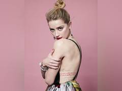 
      
      Amber Heard dismisses rumours of being removed from 'Aquaman 2'
      
      