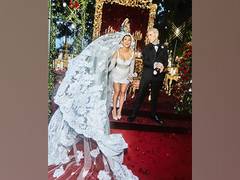 
      
      Kourtney and Travis release pictures from wedding ceremony
      
      