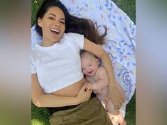 
      
      Olivia Munn 'only has love' for postpartum body
      
      