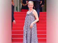 
      
       Michelle Williams flaunts her baby bump at Cannes 2022 
      
      