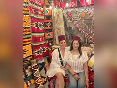 
      
      Hema Malini and Esha Deol twin in white on 'all girls trip'
      
      