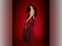 
      
      Janhvi Kapoor shimmers in a red hot backless gown
      
      