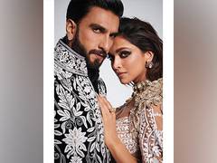 
      
      Ranveer Singh, Deepika Padukone look elegant in Manish Malhotra'
      
      