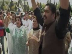 
      
      'Imran Khan to save Pakistan', supporters outside Pak Parliament
      
      