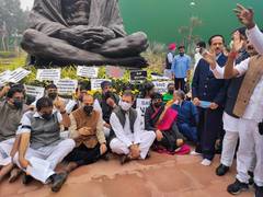 
      
      Winter session: Opposition leaders stage protest wearing...
      
      