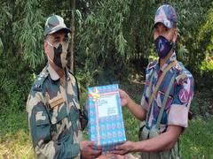 
      
      BSF personnel exchange sweets with Border Guard, Bangladesh...
      
      