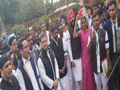 
      
      Along with Cong MPs, Rahul Gandhi protest at Parliament to...
      
      