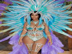 
    Nicki Minaj shows off curves in revealing carnival outfit
    