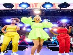 
      
      Katy Perry shows off baby bump at Australian Benefit Concert
      
      