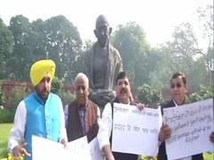 
      
      AAP protests in Parliament, demands inclusion of bill on...
      
      