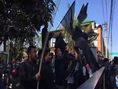 
      
      AASU members show black flags to convoy of Assam cabinet minister
      
      